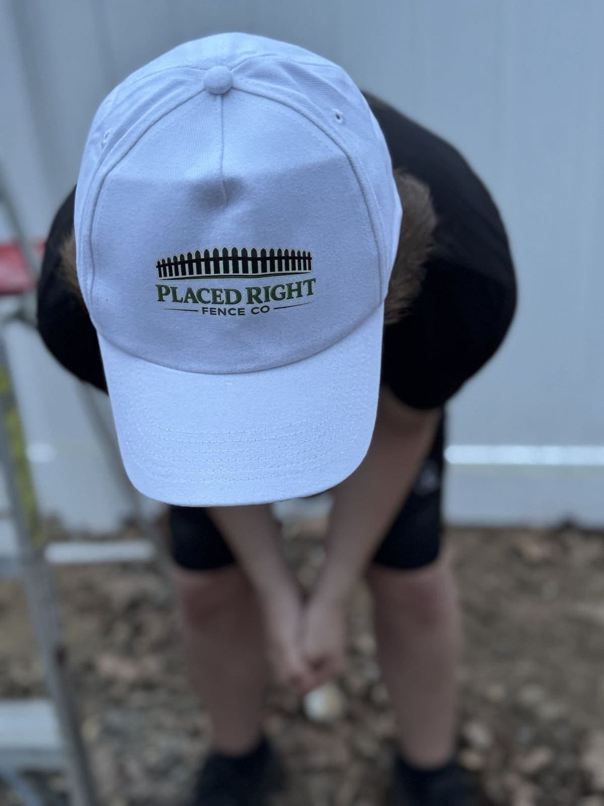 Placed Right Fence crew cap on the job